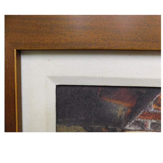 Close-up of a wooden picture frame with a painting inside.