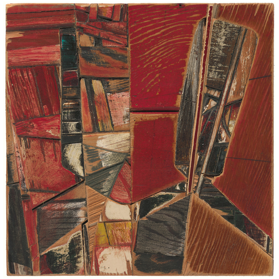 Wood abstract artwork made of wood pieces mostly in colours red, brown white