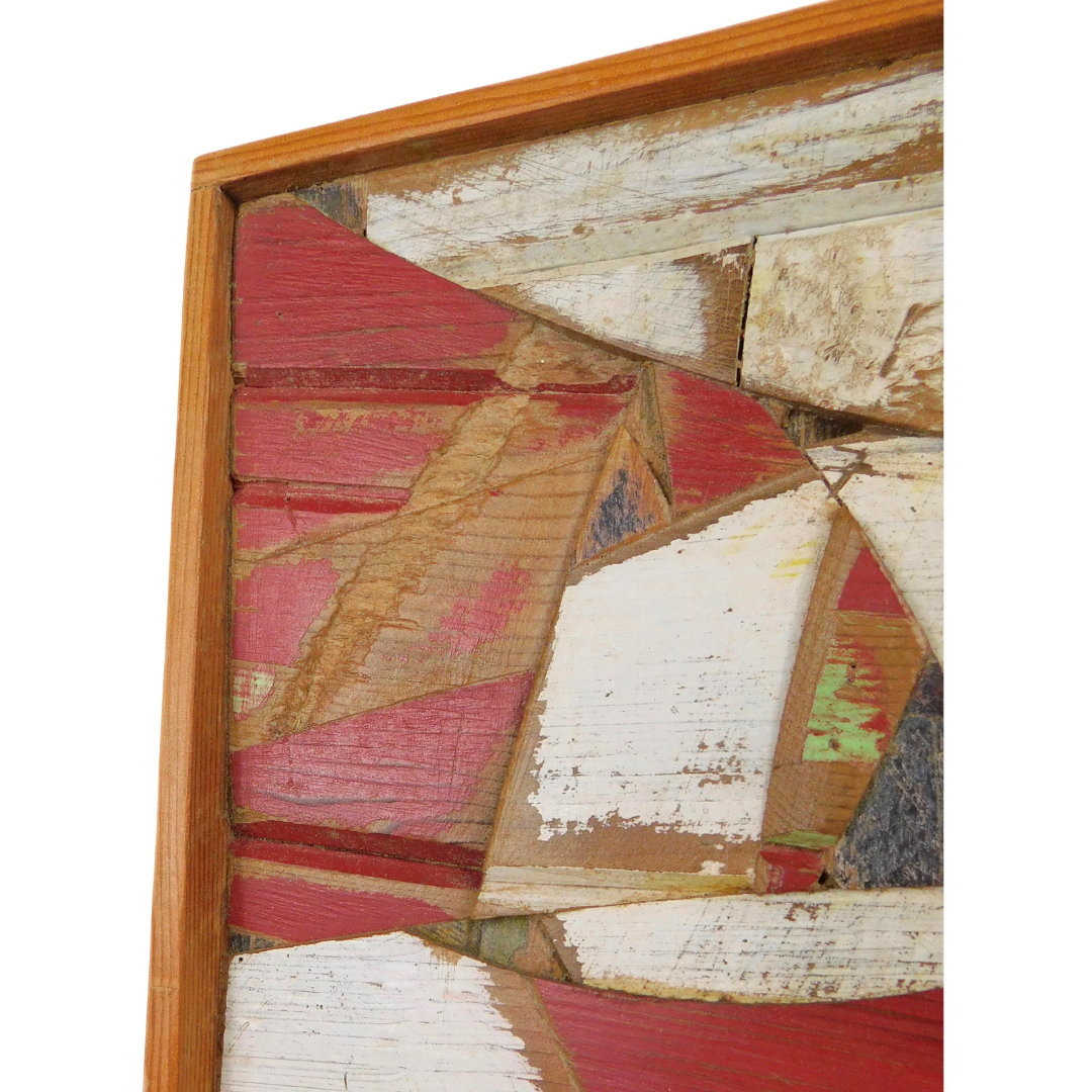 Artistic wooden panel with geometric shapes and a wooden frame, close-up of section