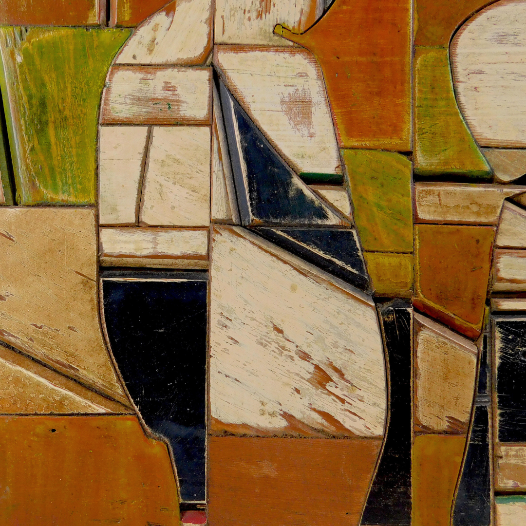 Clouse up of abstract mosaic artwork with geometric shapes in earthy tones