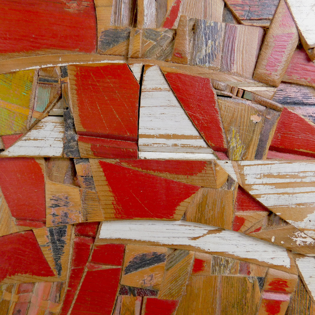 Artwork made from various colored wooden pieces.