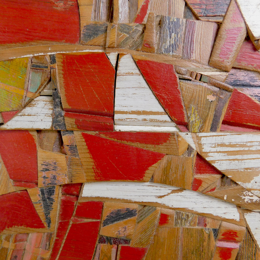 Artwork made from various colored wooden pieces.